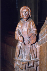 Carved bench end, Forncett St. Peter church